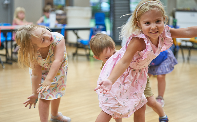 Students in a summer camp at the Arvada Center dance together